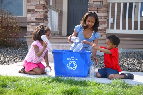 Workers segregating waste during a clearance operation